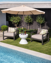 Load image into Gallery viewer, Ari_table__pool_lounger umbrella next to pool