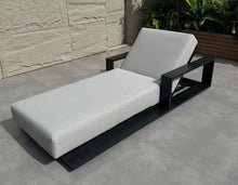 Load image into Gallery viewer, Noosa outdoor sun lounger with white quick-dry cushion and charcoal frame beside a pool